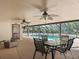 Pool patio with ample seating, perfect for entertaining, all set under an enclosing screen at 16 Northern Dancer Dr, Ocala, FL 34482