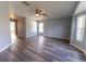 Large bedroom featuring hard flooring and bright natural lighting at 16201 Sw 47Th Ter, Ocala, FL 34473