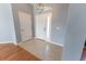 Welcoming foyer features tile flooring and a large front door with side-lights at 16201 Sw 47Th Ter, Ocala, FL 34473