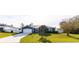 Charming single-story home with a manicured lawn and a two-car garage at 16201 Sw 47Th Ter, Ocala, FL 34473