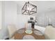 Breakfast nook features a modern chandelier and a table with seating for four at 1910 Se 28Th Pl, Ocala, FL 34471