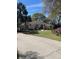 Charming home with mature trees and a well-manicured lawn at 19903 Sw 97Th Ln, Dunnellon, FL 34432