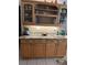 Kitchen with cabinets, under cabinet lighting, and granite countertops at 19903 Sw 97Th Ln, Dunnellon, FL 34432