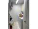 Functional laundry room with washer, dryer, and storage cabinets at 19903 Sw 97Th Ln, Dunnellon, FL 34432