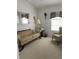 Cozy living room with comfortable seating and natural light at 19903 Sw 97Th Ln, Dunnellon, FL 34432