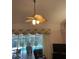 Living room with fan, pool views and access at 19903 Sw 97Th Ln, Dunnellon, FL 34432