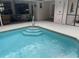Refreshing swimming pool with patio area, providing a cool and relaxing retreat at 19903 Sw 97Th Ln, Dunnellon, FL 34432