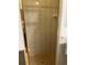 Shower stall featuring glass doors, tiled walls, and tiled floor at 19903 Sw 97Th Ln, Dunnellon, FL 34432