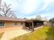 Spacious backyard featuring a screened in porch and brick paver patio at 2146 Ne 10Th St, Ocala, FL 34470