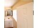 Bathroom featuring a modern vanity, framed mirror, and natural light at 2146 Ne 10Th St, Ocala, FL 34470