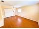 Bedroom features hardwood floors, a closet, and a window at 2146 Ne 10Th St, Ocala, FL 34470
