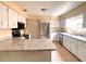 Bright kitchen featuring stainless steel appliances and granite countertops at 2146 Ne 10Th St, Ocala, FL 34470