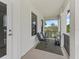 Outdoor balcony with seating, offering a relaxing space to enjoy the neighborhood views at 3920 Se 7Th Ave, Ocala, FL 34480