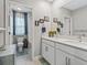 Bathroom featuring a double vanity and shower/tub combo at 3920 Se 7Th Ave, Ocala, FL 34480
