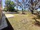 Backyard view showing the concrete patio at 416 Marion Oaks Crse, Ocala, FL 34473