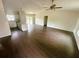 Bright and spacious living room featuring wood floors and a ceiling fan at 416 Marion Oaks Crse, Ocala, FL 34473