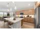 Beautiful kitchen with an island, stainless steel appliances, and an adjacent dining area, ideal for gatherings at 4497 Nw 54Th Ter, Ocala, FL 34482
