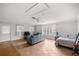 Open living room with tile flooring and many windows letting in natural light at 4516 Ne 8Th St, Ocala, FL 34470