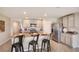Eat-in kitchen with granite countertops, stainless steel appliances, and center island with seating at 4738 Sw 88Th Ln, Ocala, FL 34476