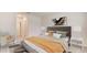 Cozy bedroom featuring a comfortable bed and soft lighting for a relaxing retreat at 4754 Sw 88Th Ln, Ocala, FL 34476