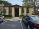 Charming two-story condo building with well-maintained landscaping and ample parking at 501 Fairways Ln # A, Ocala, FL 34472