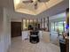 Bright dining area features tile floors, unique ceiling and easy access to the outdoor space at 501 Fairways Ln # A, Ocala, FL 34472