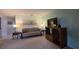 Inviting living room with comfortable seating, warm lighting, and neutral walls at 501 Fairways Ln # A, Ocala, FL 34472