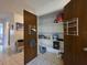Walk-in pantry with shelves, providing ample storage space for household goods at 501 Fairways Ln # A, Ocala, FL 34472