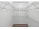 Spacious walk-in closet offering ample storage with adjustable wire shelving, perfect for organization at 501 Fairways Ln # A, Ocala, FL 34472