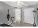 Spacious bedroom features a guitar, a closet, and neutral decor offers a relaxing retreat at 5781 Sw 39Th St, Ocala, FL 34474