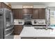 Kitchen with stainless steel appliances, tile backsplash, and ample counter space at 5781 Sw 39Th St, Ocala, FL 34474