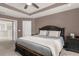 Comfortable main bedroom with ceiling fan and ensuite bathroom access at 5781 Sw 39Th St, Ocala, FL 34474
