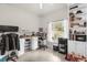 Functional home office with a built-in bookcase, bright lighting, and plenty of workspace at 5781 Sw 39Th St, Ocala, FL 34474