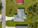 Overhead view of the home highlighting roof, driveway, and landscaping at 5877 Sw 103Rd St, Ocala, FL 34476