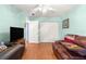Bedroom offering comfortable seating with a plush leather sofa at 5877 Sw 103Rd St, Ocala, FL 34476