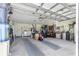 Spacious garage with storage and laundry area at 5877 Sw 103Rd St, Ocala, FL 34476