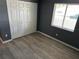Bedroom features a closet, a window offering natural light and vinyl plank flooring at 6082 Sw 104Th St, Ocala, FL 34476