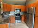 Well-equipped kitchen with stainless steel appliances and decorative backsplash at 6082 Sw 104Th St, Ocala, FL 34476