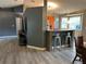 A spacious living area boasts modern flooring and neutral paint, creating an inviting atmosphere at 6082 Sw 104Th St, Ocala, FL 34476