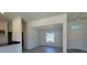 Open dining area featuring durable flooring, a window, and views into other rooms at 6134 Sw 155Th Street Road, Ocala, FL 34473