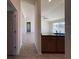 Open-concept living area offering an eat-in bar at 6134 Sw 155Th Street Road, Ocala, FL 34473