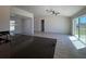 Open floor plan with a kitchen island and a spacious living area filled with natural light at 6134 Sw 155Th Street Road, Ocala, FL 34473