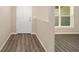 The entryway has wood-look flooring and a window for natural light at 7798 Sw 134Th Ave, Dunnellon, FL 34432