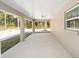 A covered patio with a ceiling fan is perfect for enjoying the outdoors at 7798 Sw 134Th Ave, Dunnellon, FL 34432