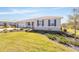 Well maintained single-story home with symmetrical landscaping, manicured lawn and tasteful shrubbery at 8218 Sw 92Nd Cir, Ocala, FL 34481