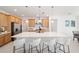 Kitchen featuring quartz countertops, a large island with seating, and stainless steel appliances at 8218 Sw 92Nd Cir, Ocala, FL 34481
