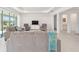 Living room with neutral walls, recessed lighting, and stylish, comfortable seating and entertainment center at 8218 Sw 92Nd Cir, Ocala, FL 34481