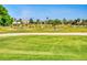 Expansive view of the golf course showcasing lush green fairways and the surrounding residential community at 9172 Se 130Th Loop, Summerfield, FL 34491