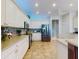 Bright kitchen with stainless steel appliances, tile backsplash, and ample counter space at 9172 Se 130Th Loop, Summerfield, FL 34491