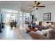 Inviting living room with tile floors and a dining area perfect for entertaining guests at 9172 Se 130Th Loop, Summerfield, FL 34491